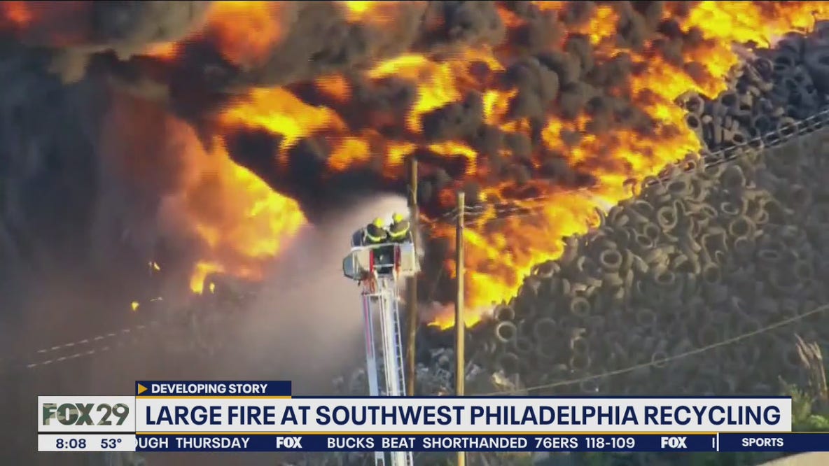 Massive fire engulfs junkyard in Southwest Philadelphia